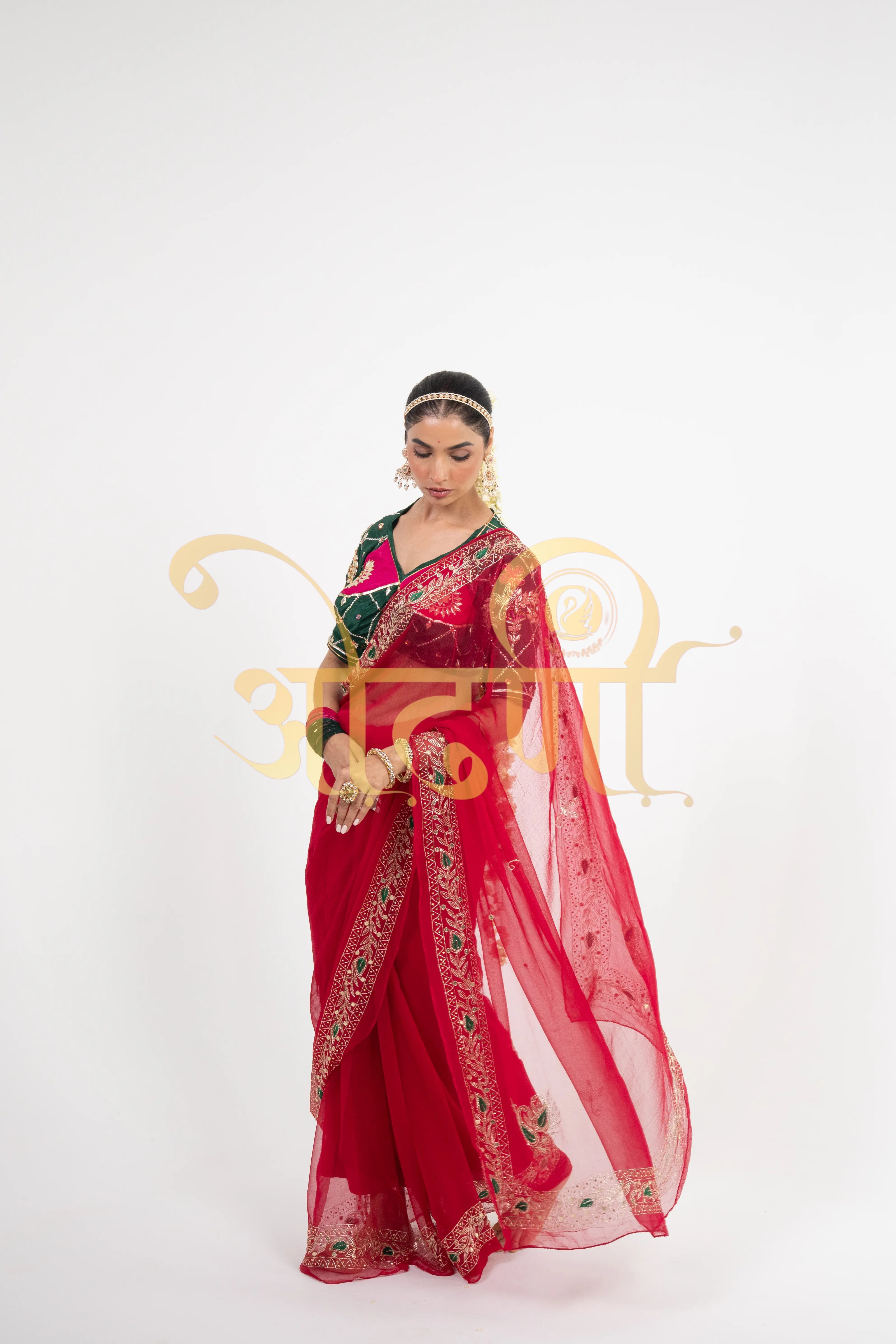 Pure Chiffon Saree with Aari Tari Work & Contrast Green Blouse