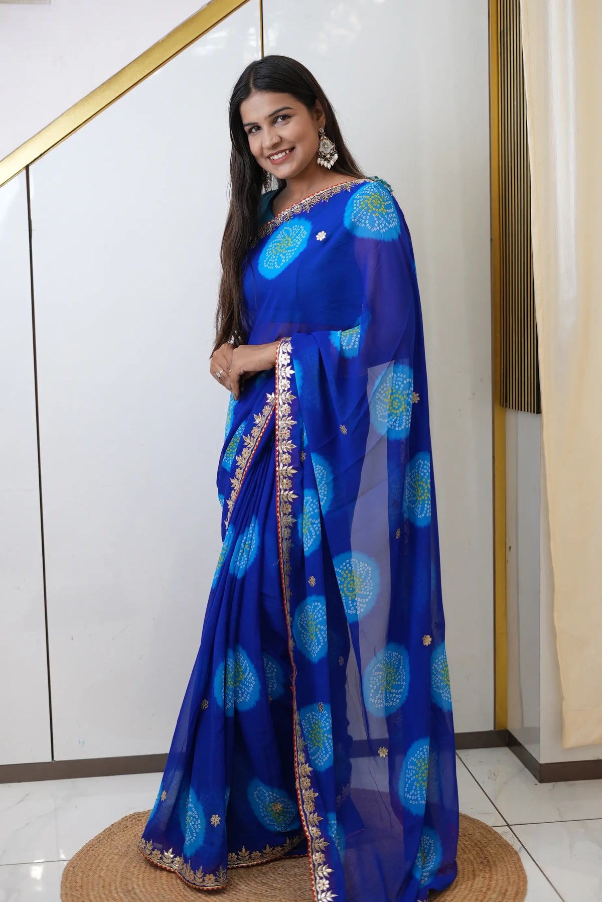 Blue Bandhani Print Saree with Gota Patti and Lace Border Work by Odhani by SRN