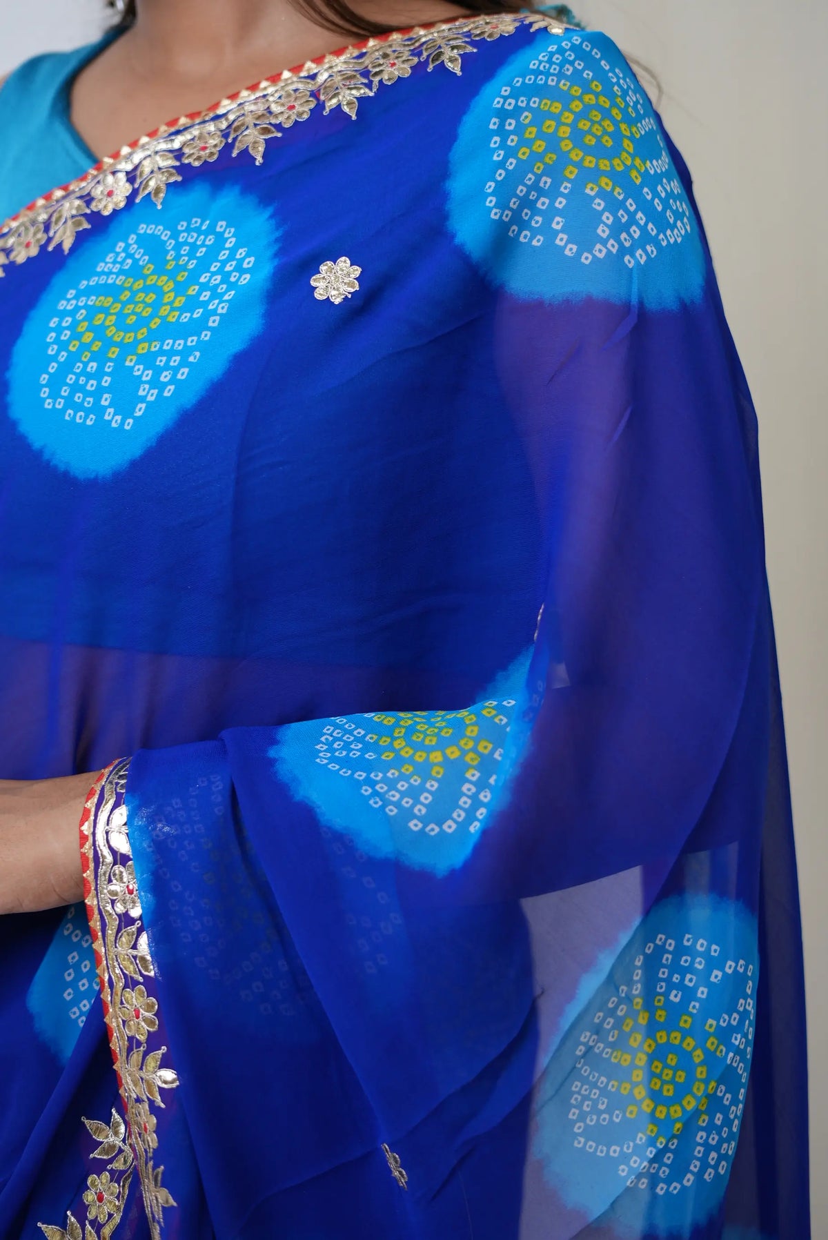 Blue Bandhani Print Saree with Gota Patti and Lace Border Work by Odhani by SRN