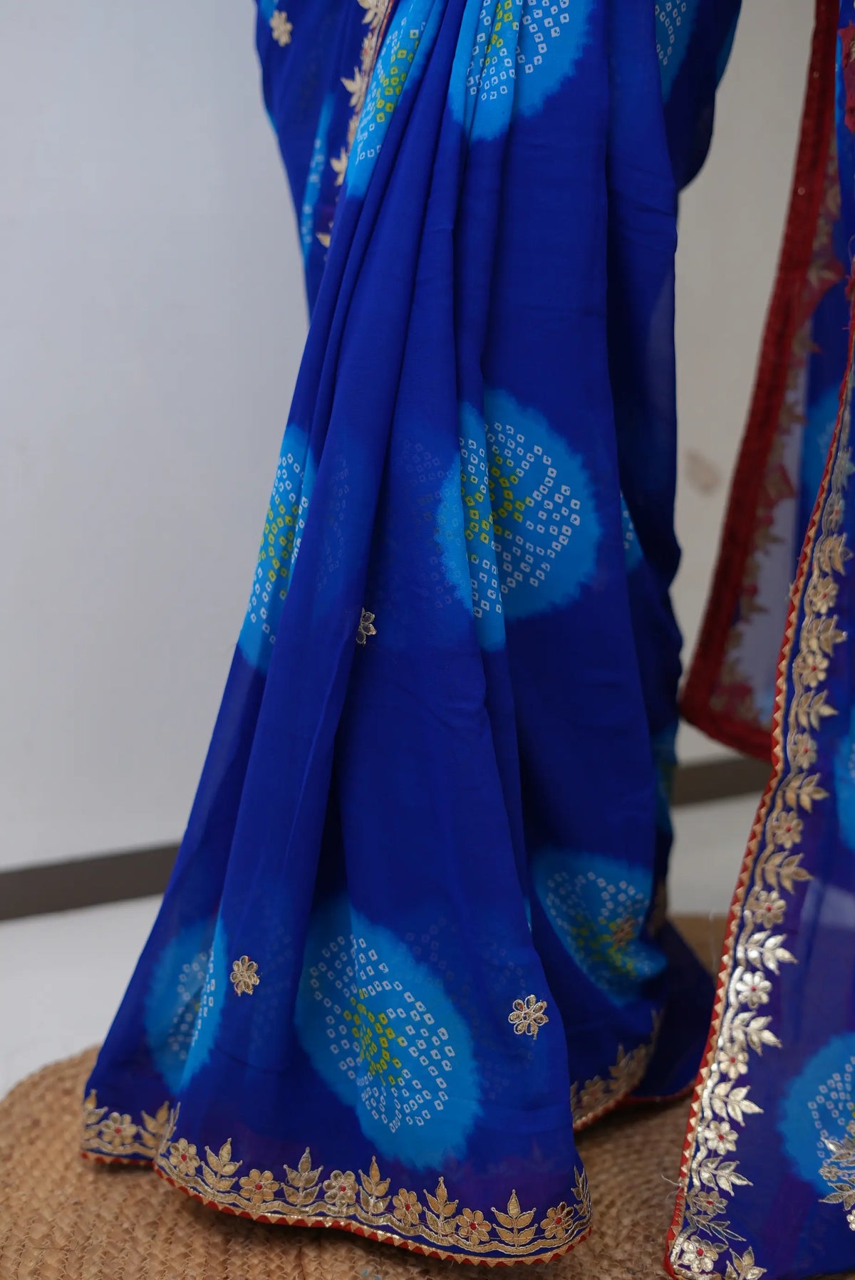 Blue Bandhani Print Saree with Gota Patti and Lace Border Work by Odhani by SRN