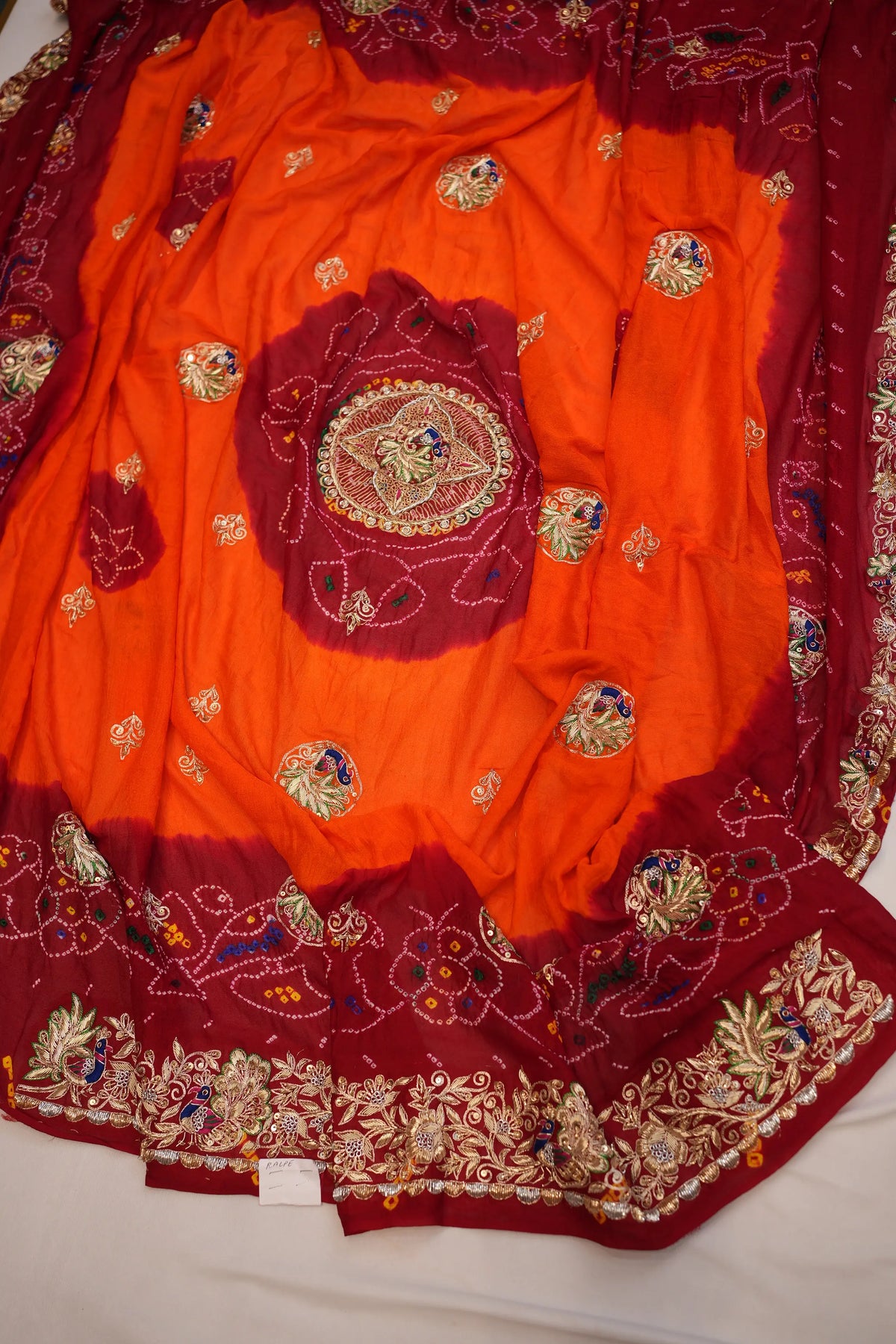Overall view of Ojariya Shekhawati Bandhani Pila Dupatta with heavy Zardozi Peacock border