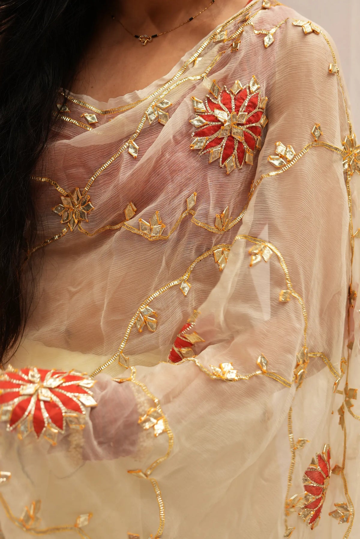 Close up view of authentic gota patti handwork on pure chiffon saree by Odhani by SRN