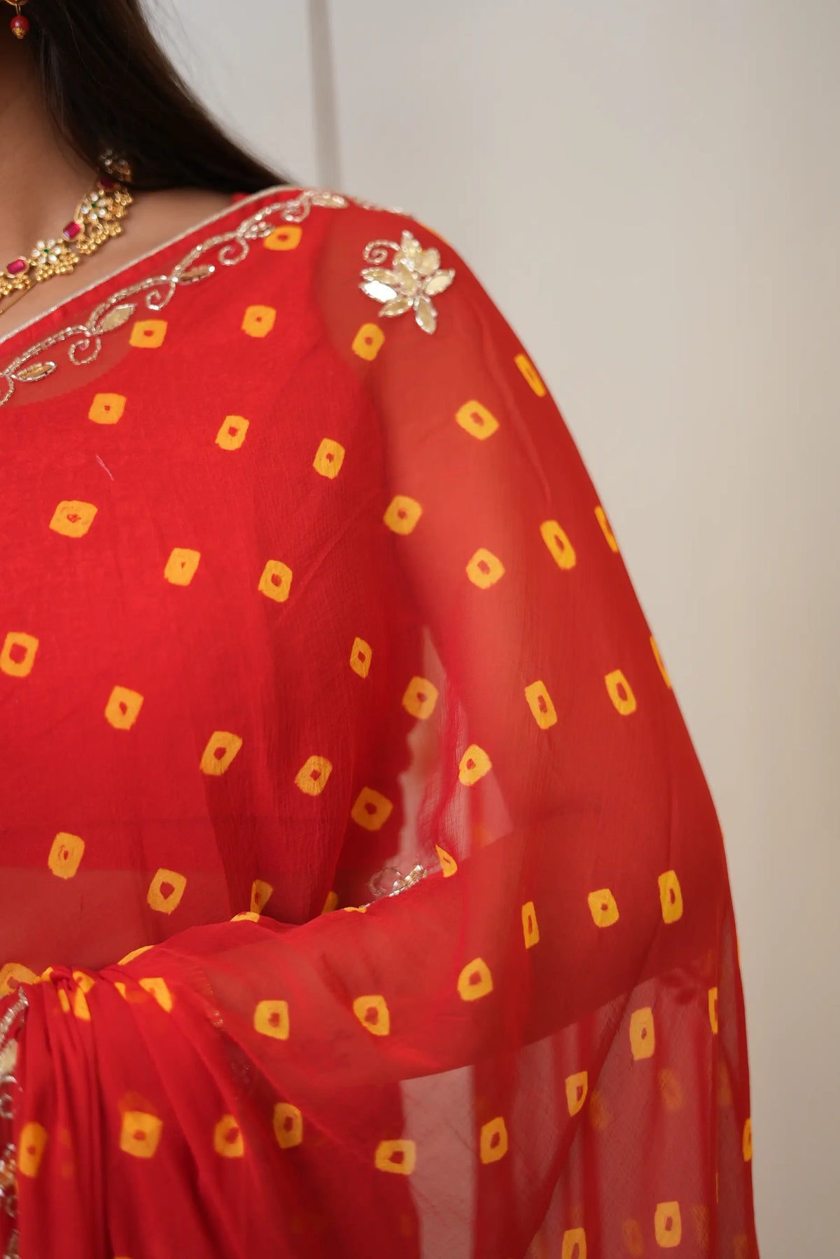Red Traditional Bandhani Saree with Cut Dana Zari Border Work by Odhani by SRN