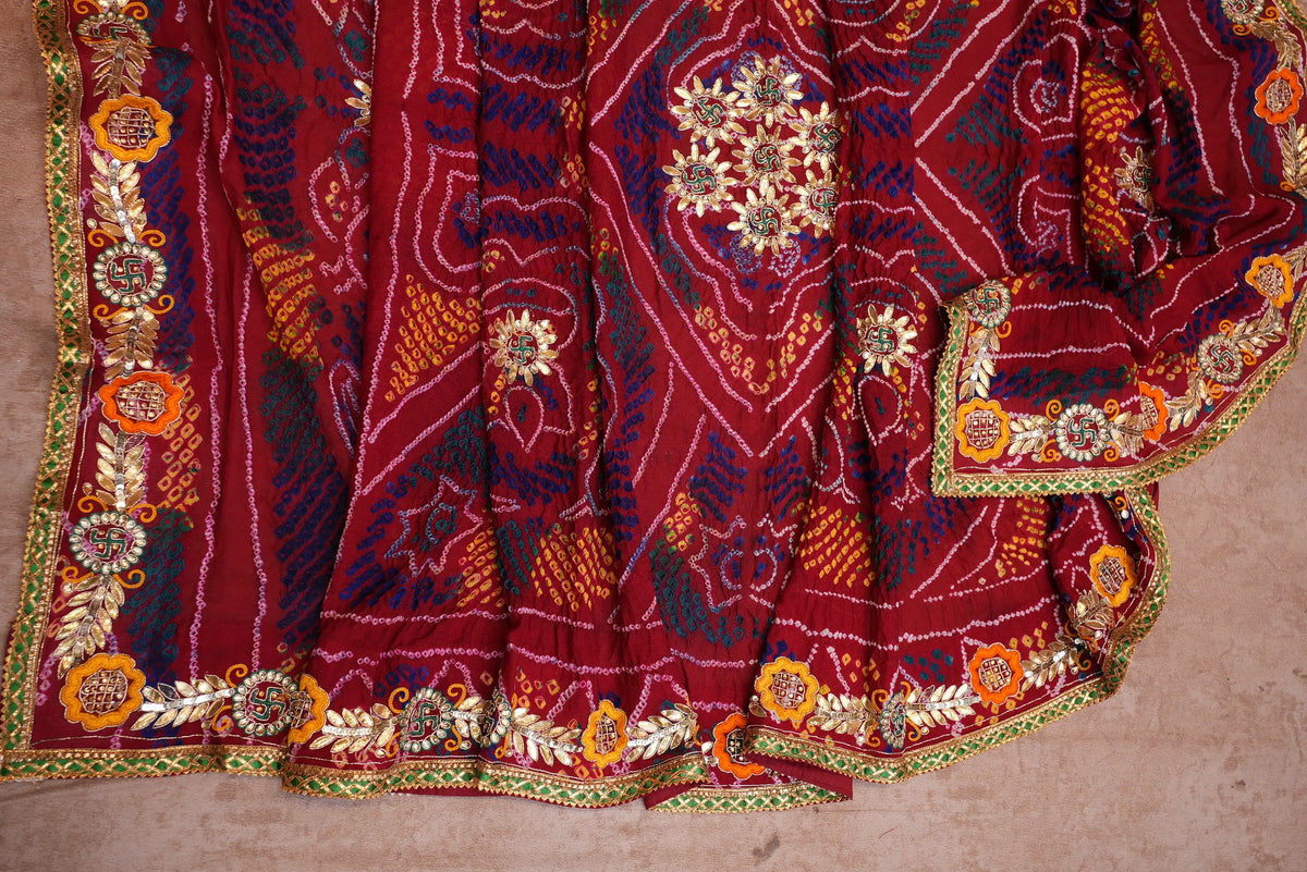 Draped view of Shekhawati Ojariya Bandhani Dupatta showing Swastik Gota Patti Motifs and Border