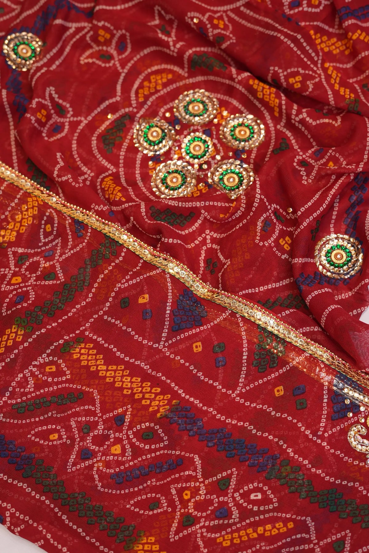 Close-up of Maroon Georgette Bandhani Chunri showcasing Cut Dana beadwork circular medallion and thin gold piping