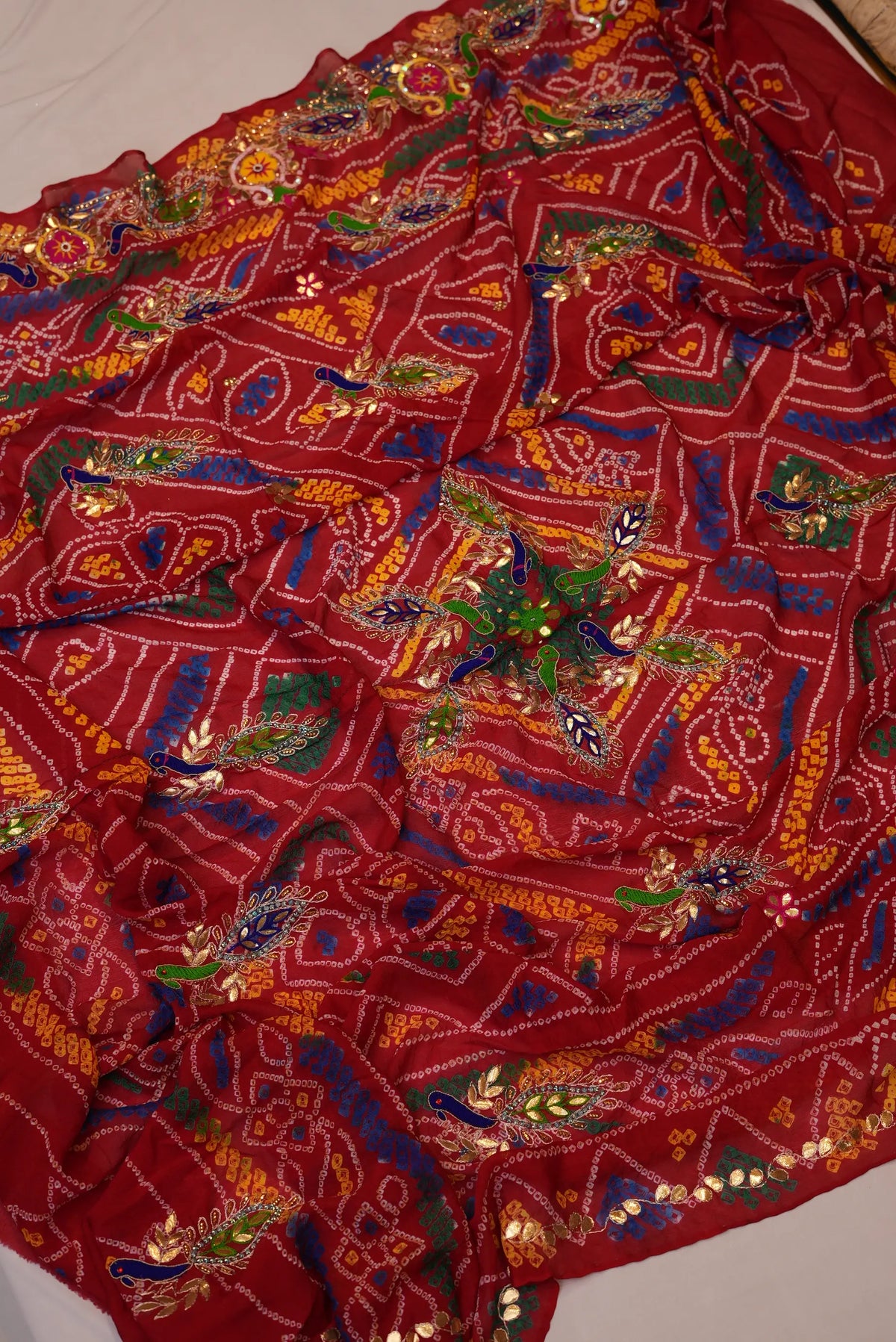 Full layout view of Red Pure Georgette Ojariya Bandhani Dupatta displaying dense Peacock buttis