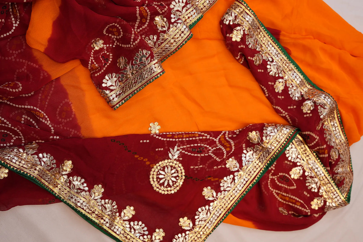 Flat layout view of Viscose Georgette Shekhawati Pila Chunri showcasing yellow center and heavy Gota work border