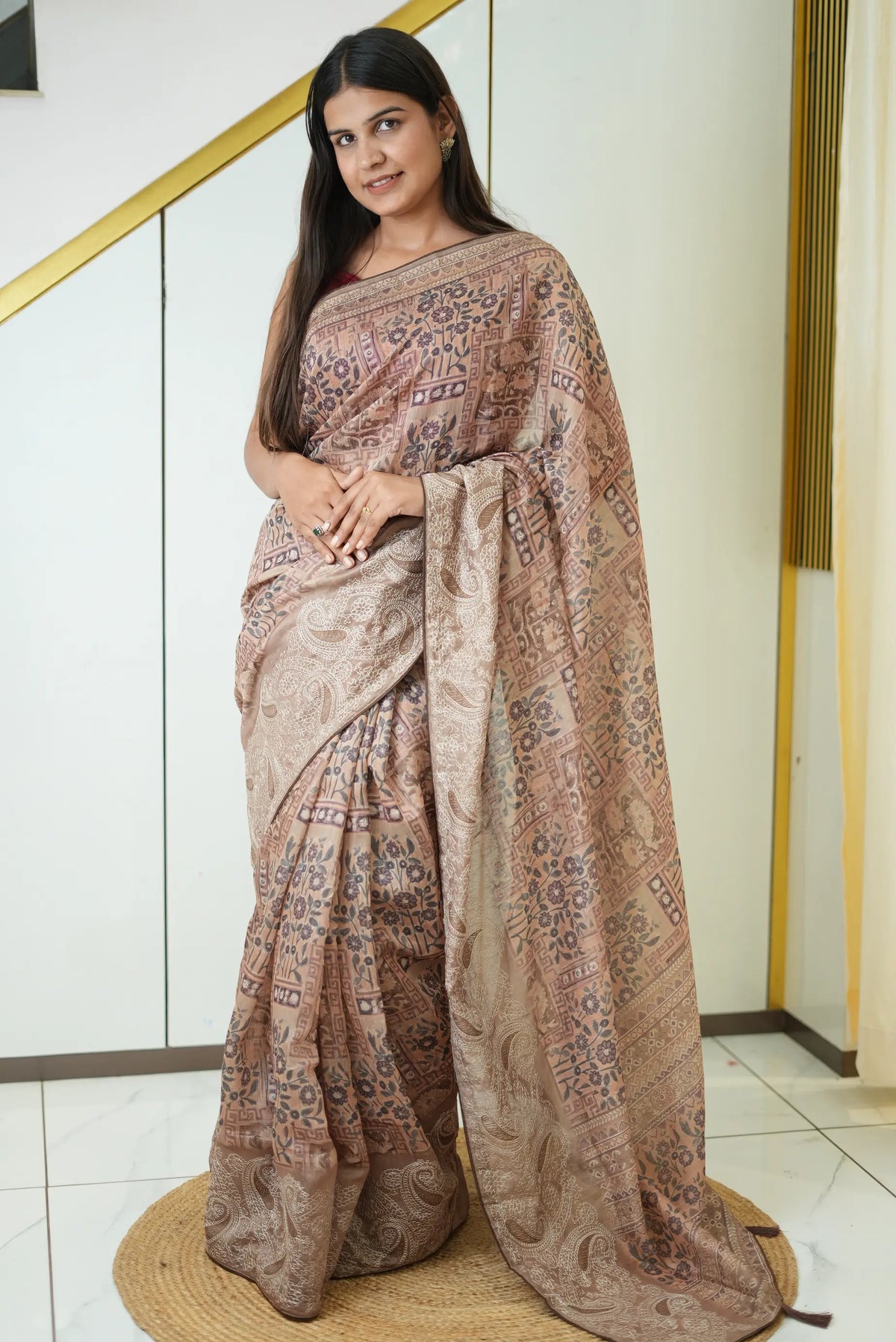 Model showcasing beige-taupe mix cotton block print saree with embroidered border and tassels