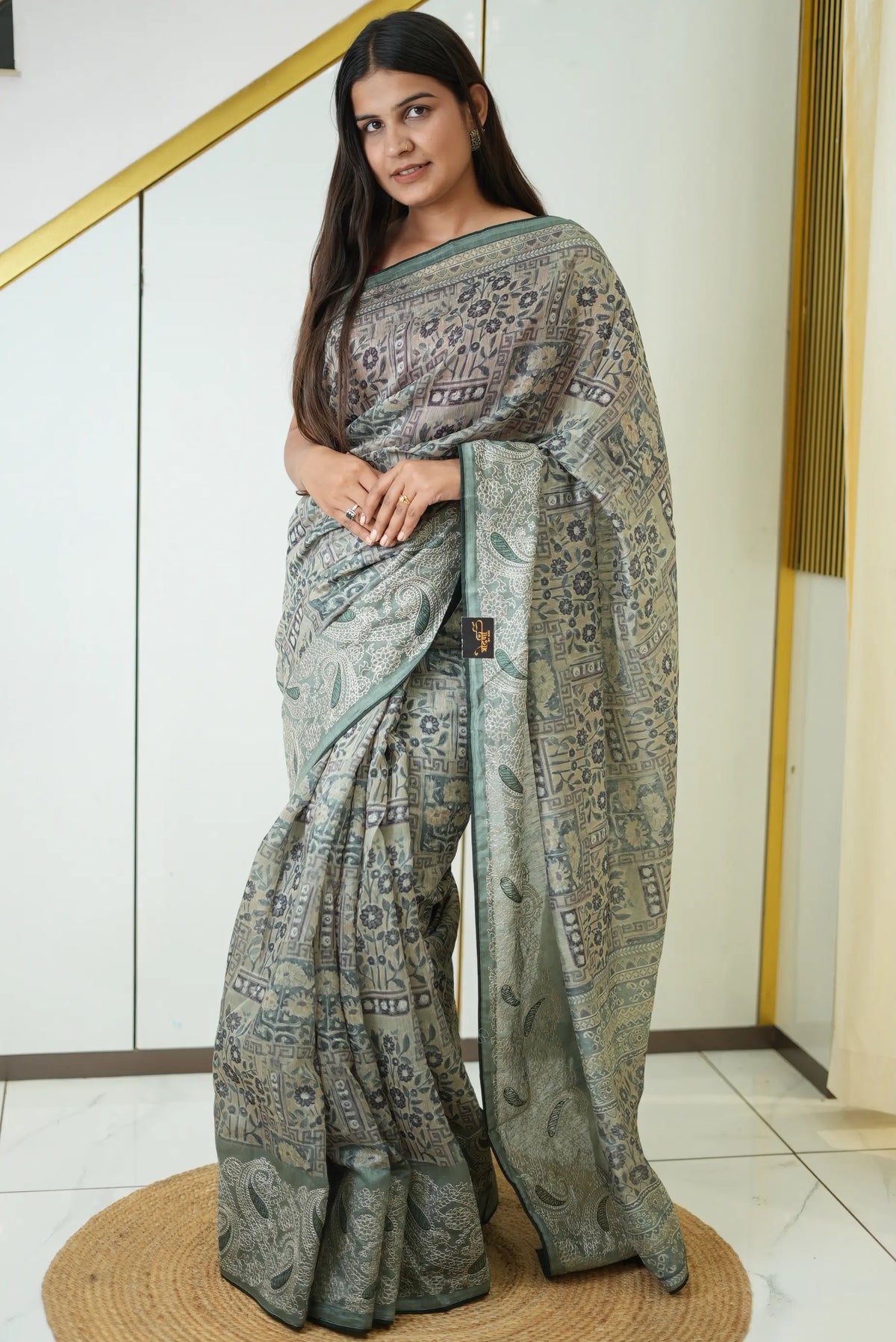 Full-length view of sage green mix cotton printed saree with thread embroidery border