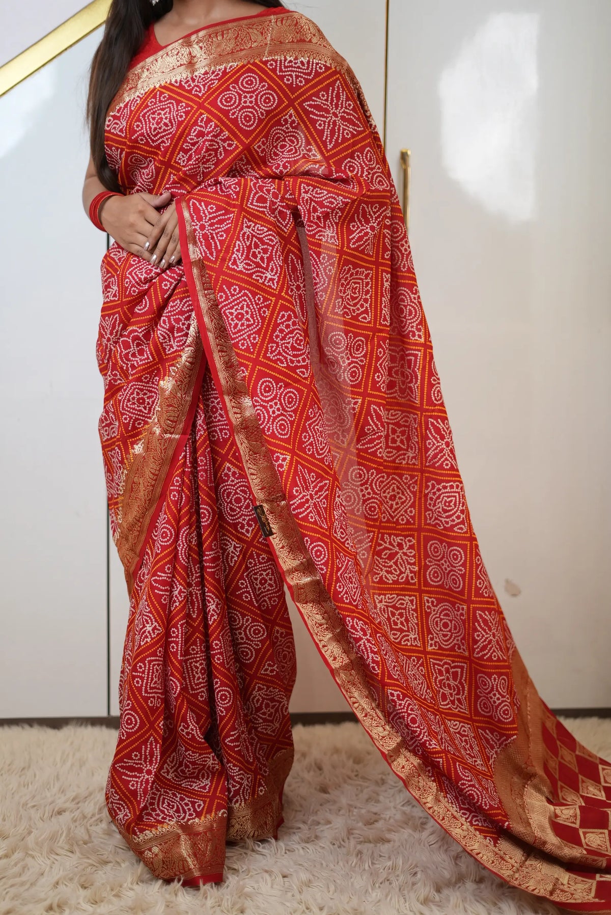 Taffeta Silk Bandhani Print Saree with Animal Motif Zari Border