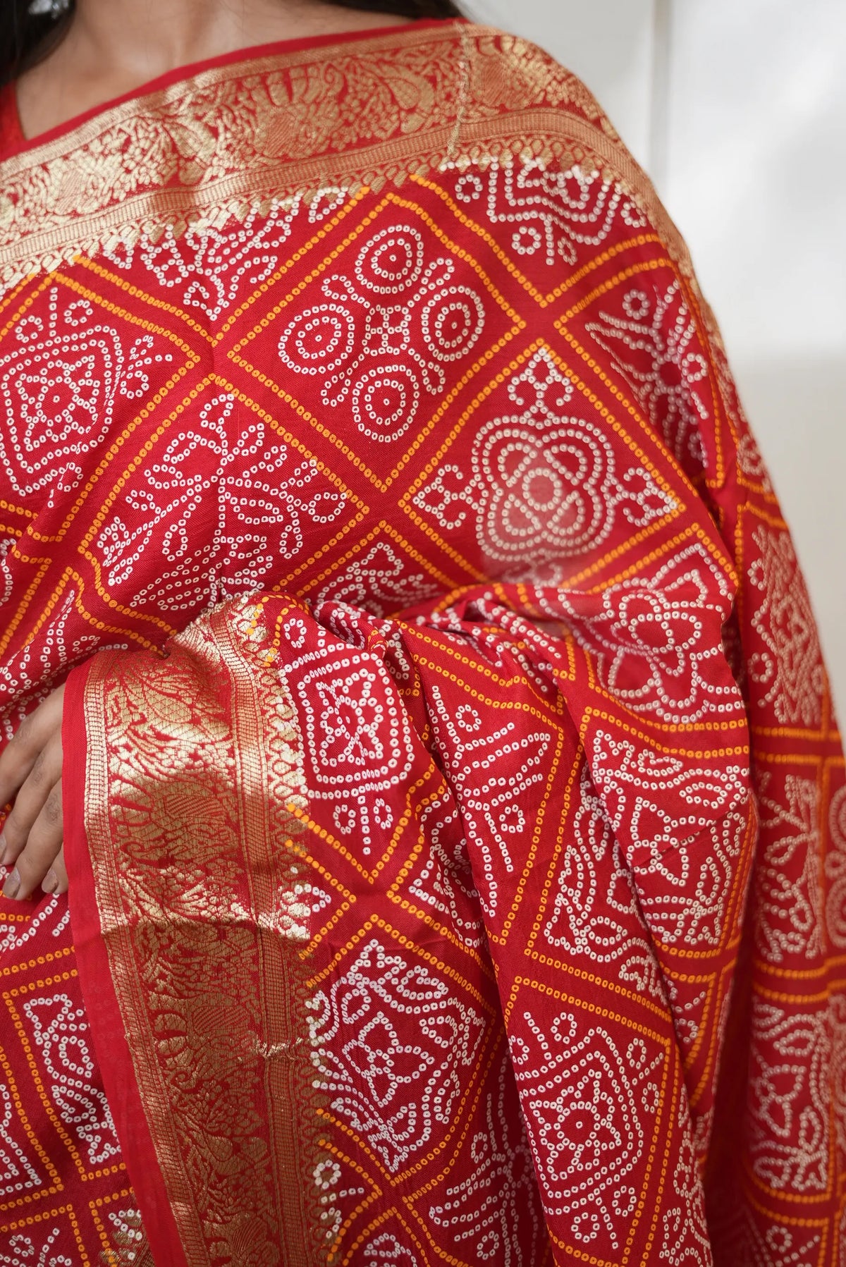 Taffeta Silk Bandhani Print Saree with Animal Motif Zari Border