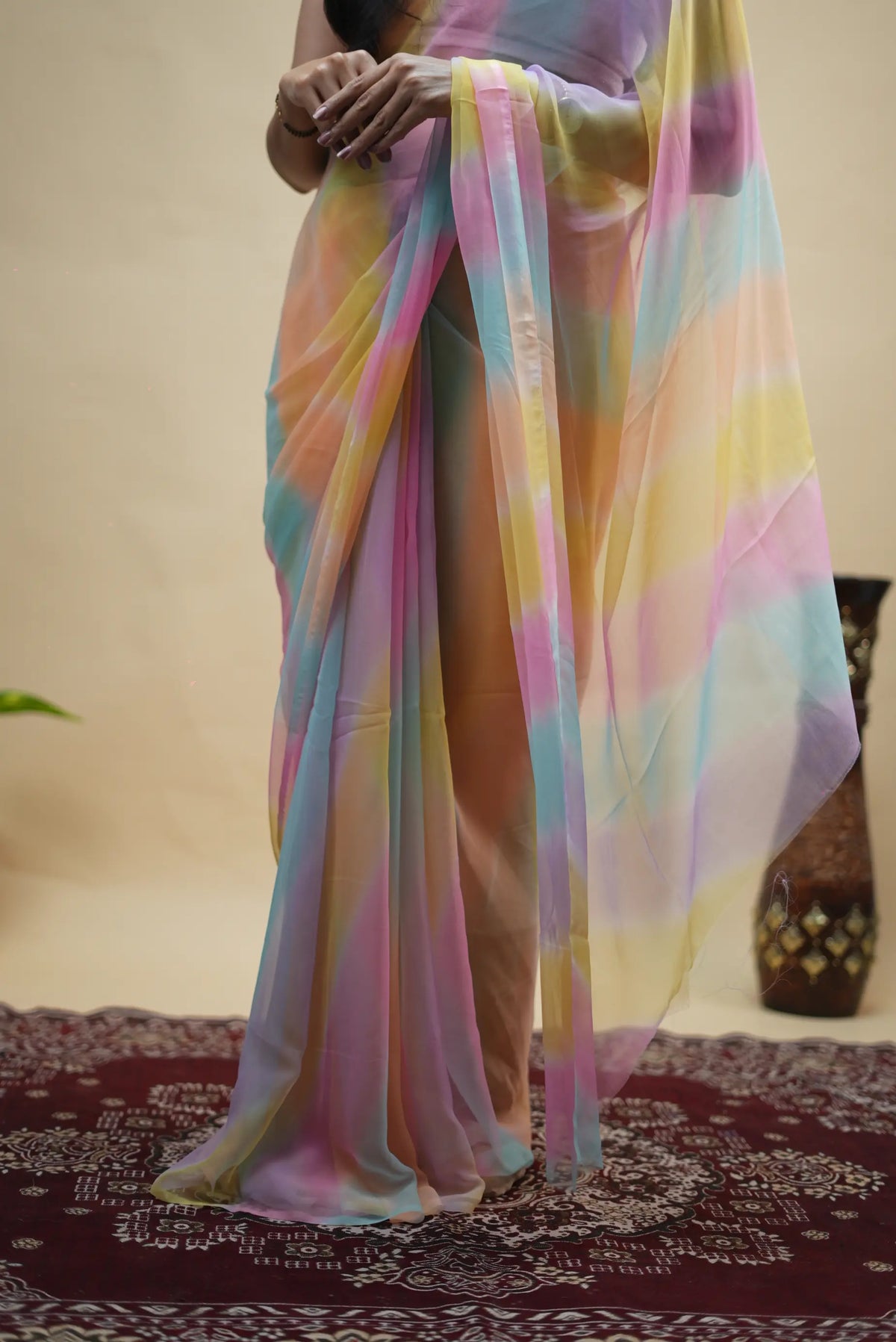 Model wearing pastel multicolor samundar leheriya georgette saree inspired by kareena kapoor instagram look