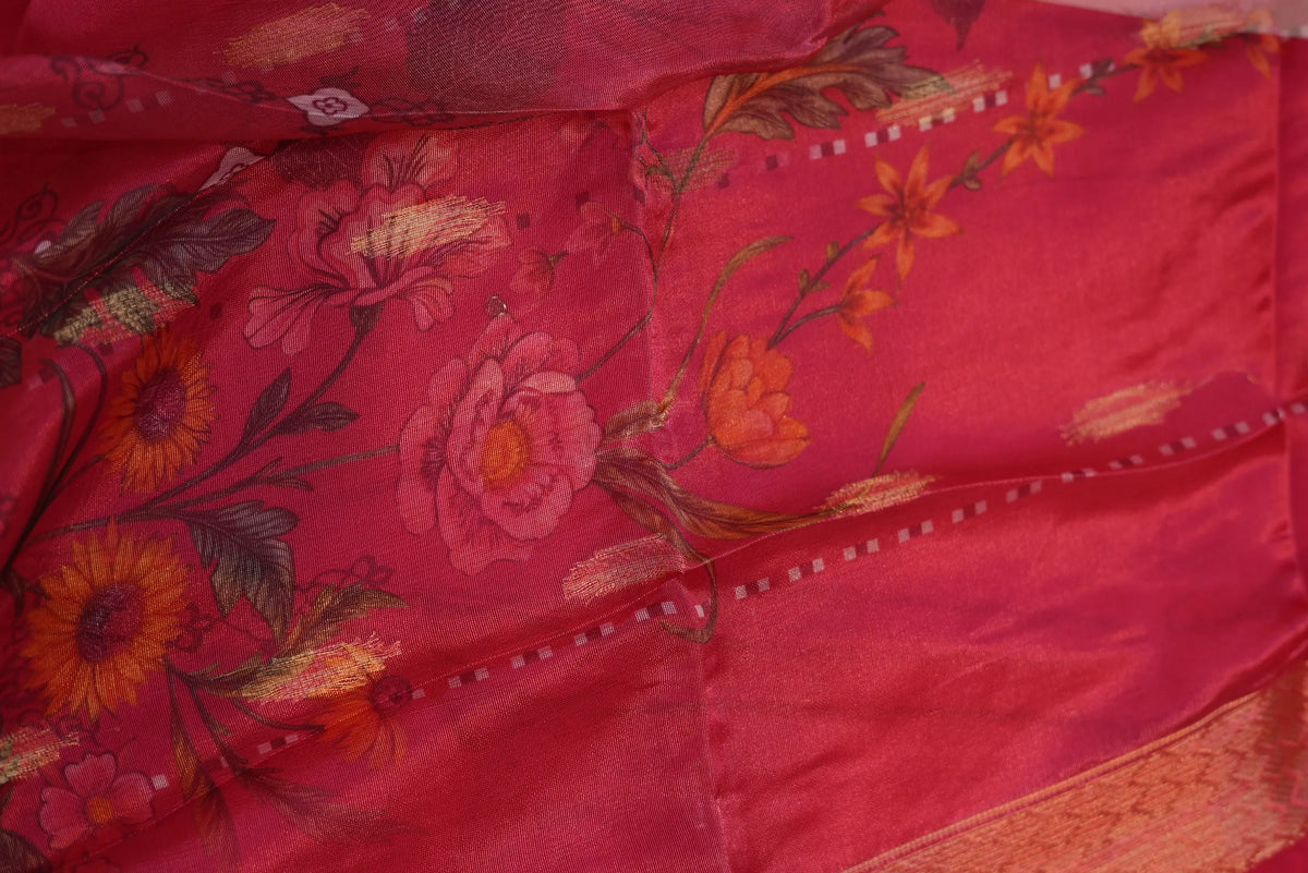 Detailed view of floral digital print on rani pink organza dupatta