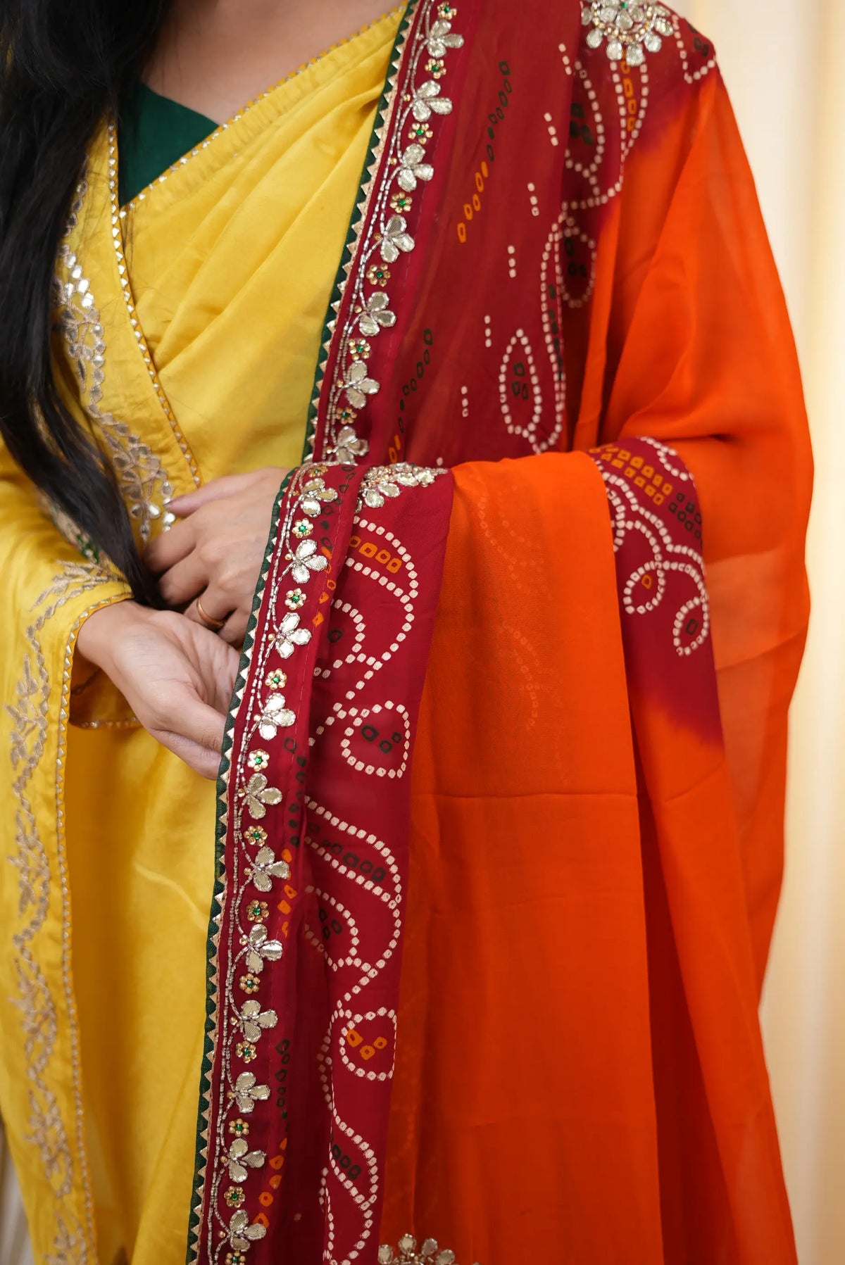 Shoulder drape shot of Shekhawati Pila dupatta with rich embroidery