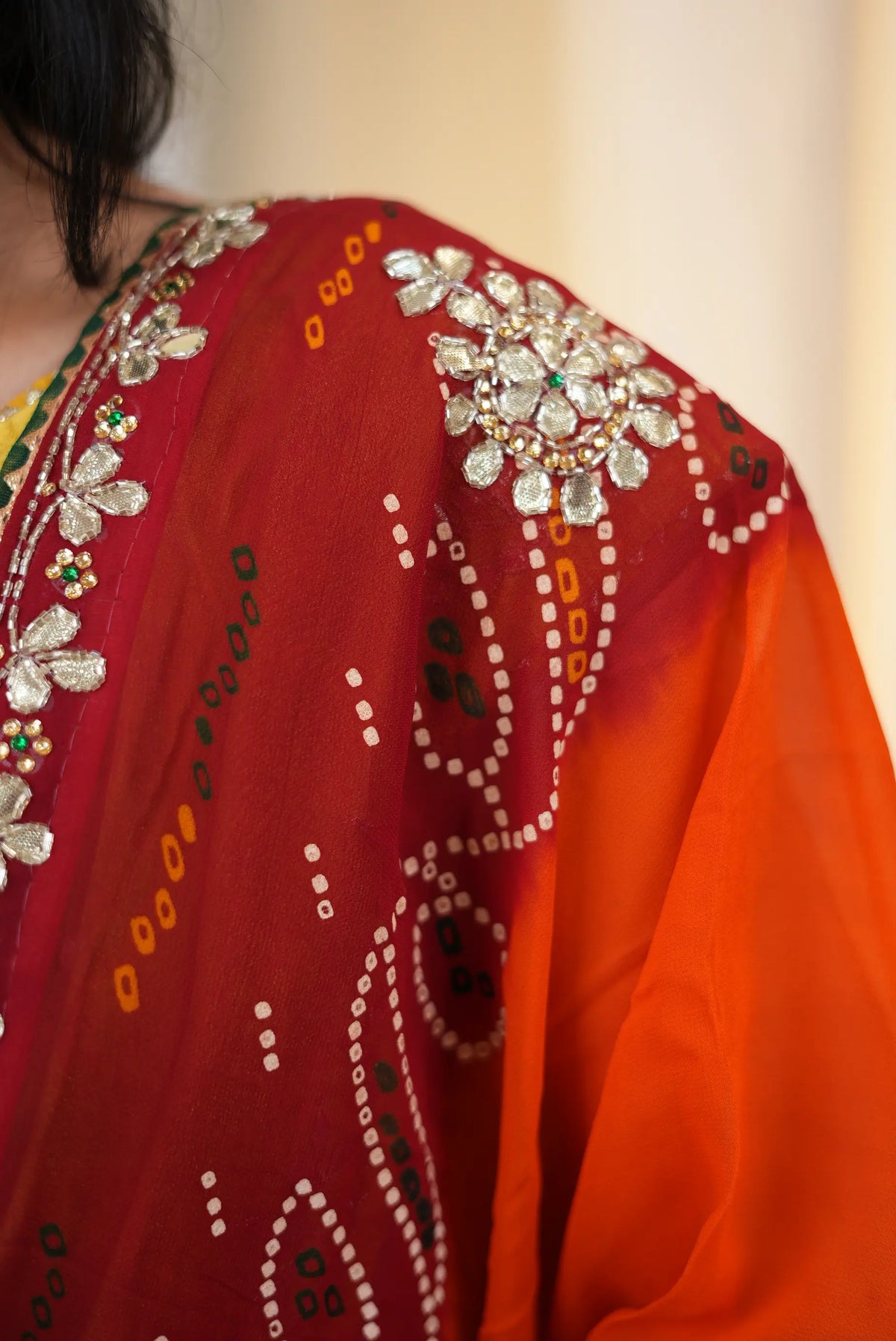 Two tone orange and red Pila dupatta fabric with gold Cut Dana handwork