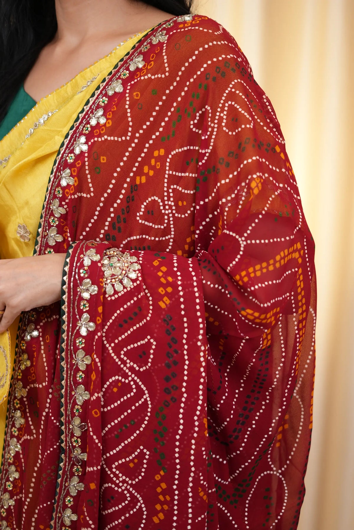 Close up of Shekhawati Bandhani chunri dupatta showing Gota Patti border and tie dye pattern