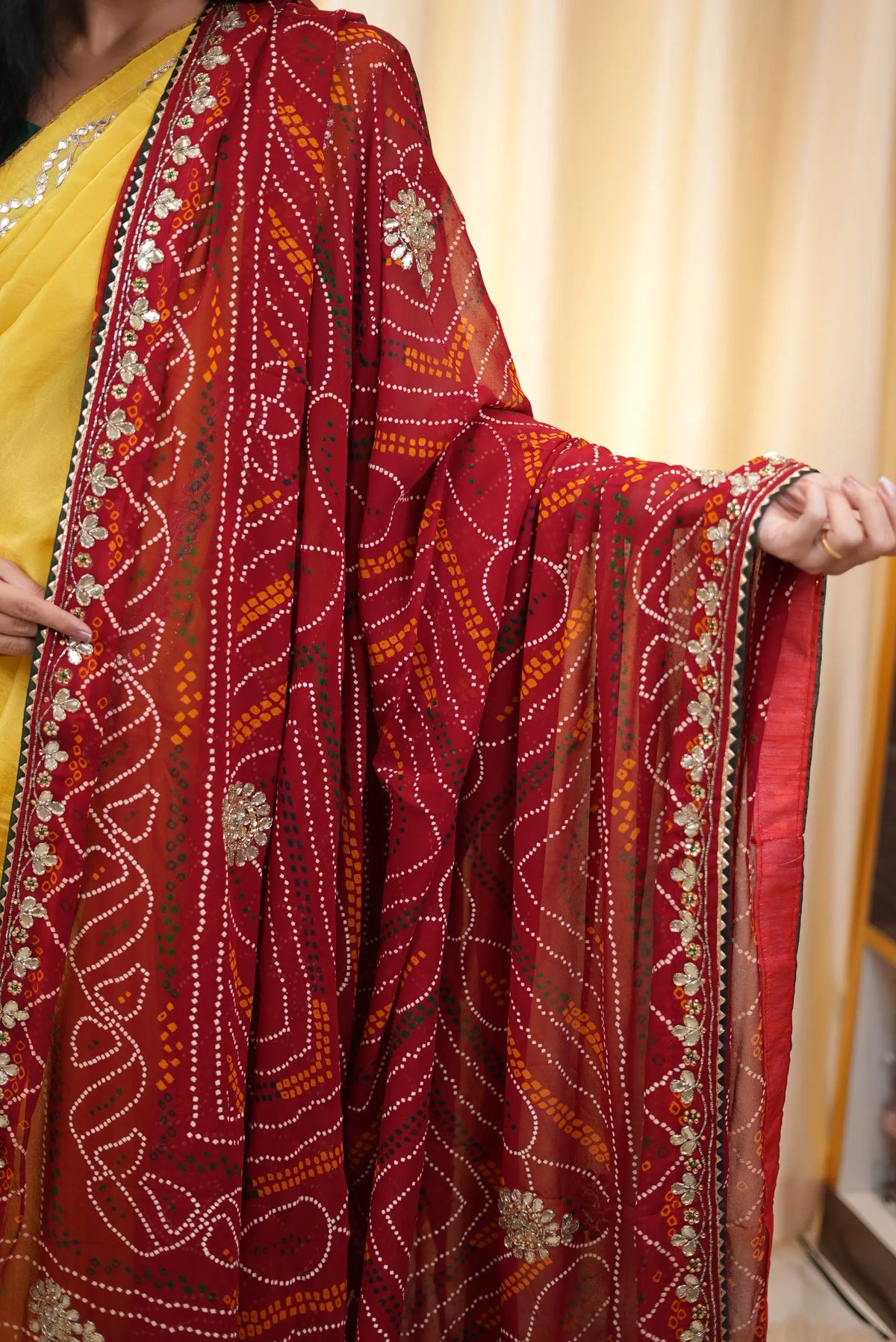 Close up of Shekhawati Bandhani chunri dupatta showing Gota Patti border and tie dye pattern