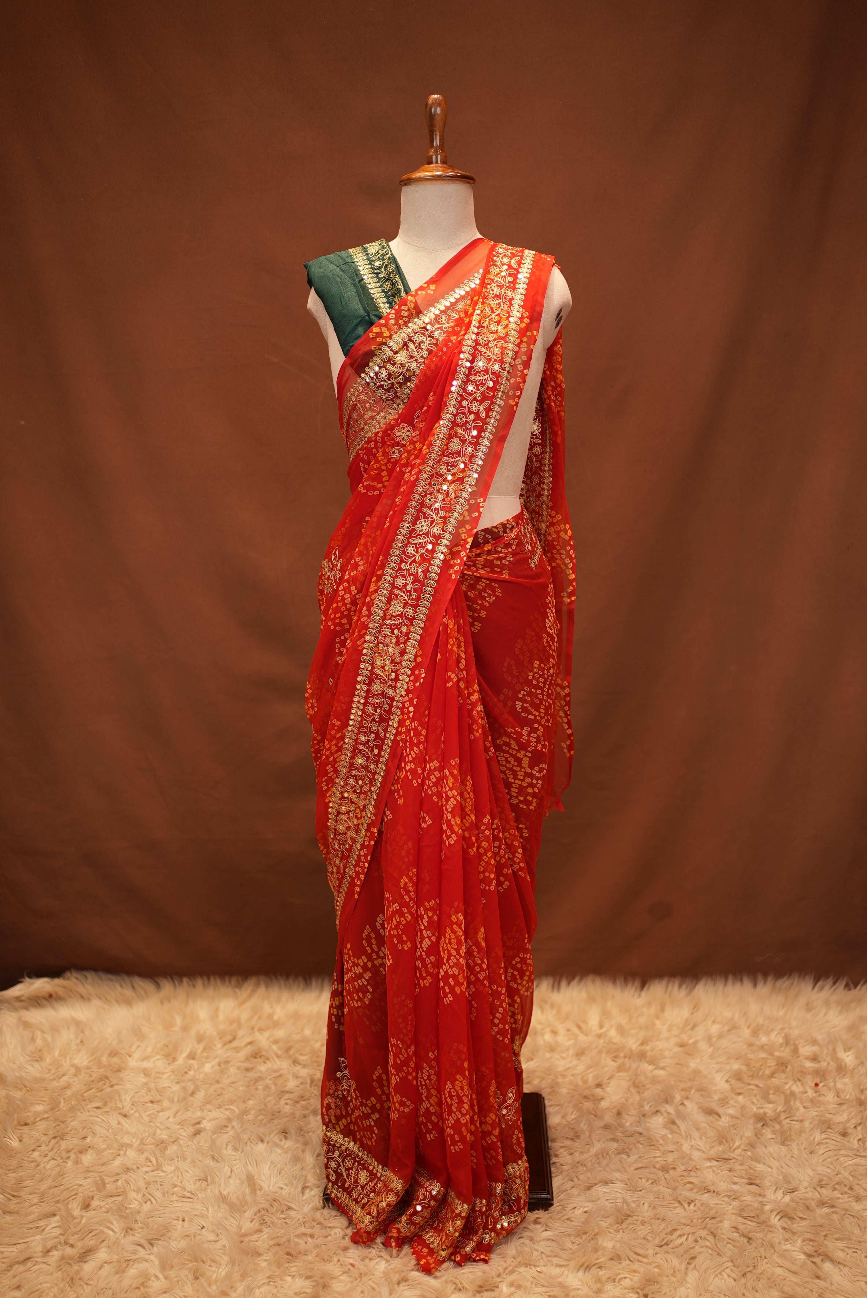 Georgette Bandhani Saree with Aari Tari Work & Green Blouse