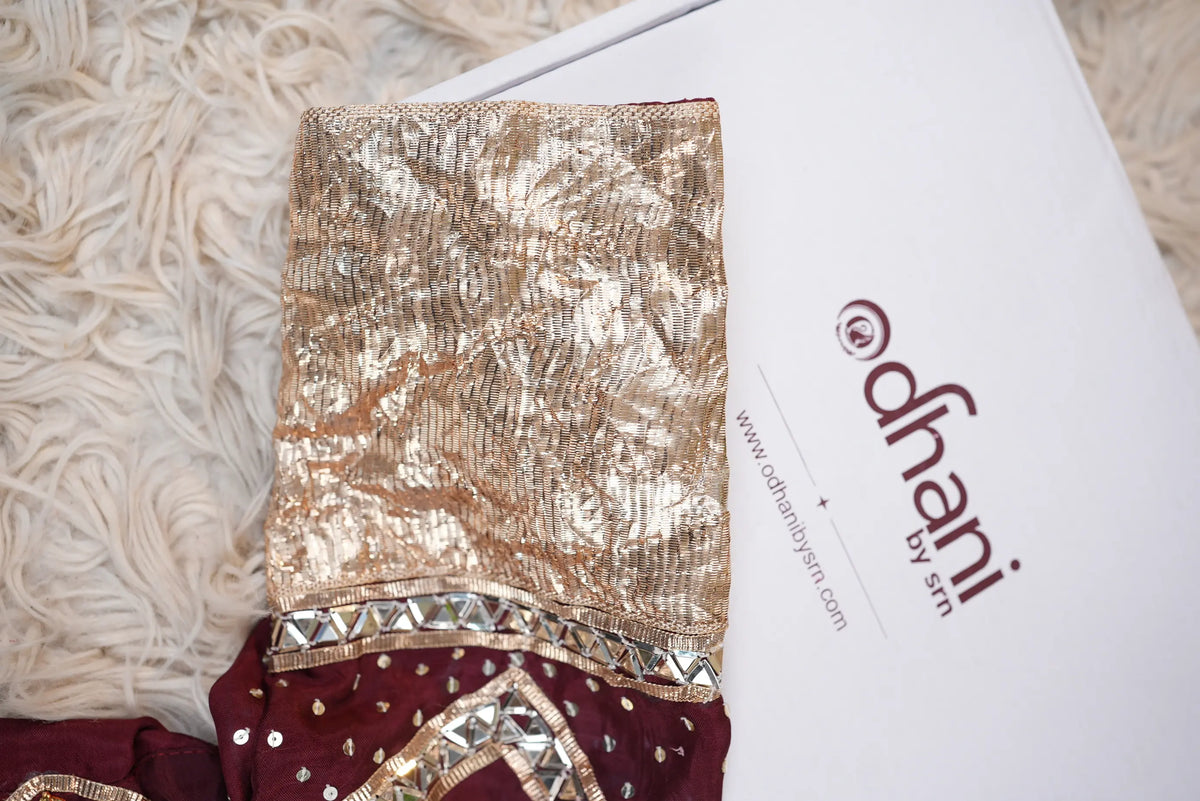 Close up macro shot of crushed gold Lappa cuff border on customized Aangi blouse sleeve