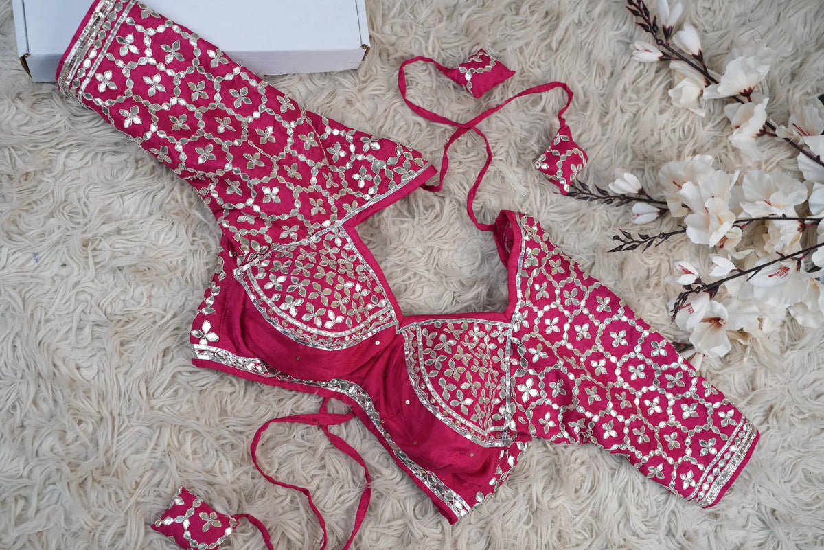 Full flat lay view of customized rani pink Gota Patti Aangi blouse displayed alongside Odhani brand box