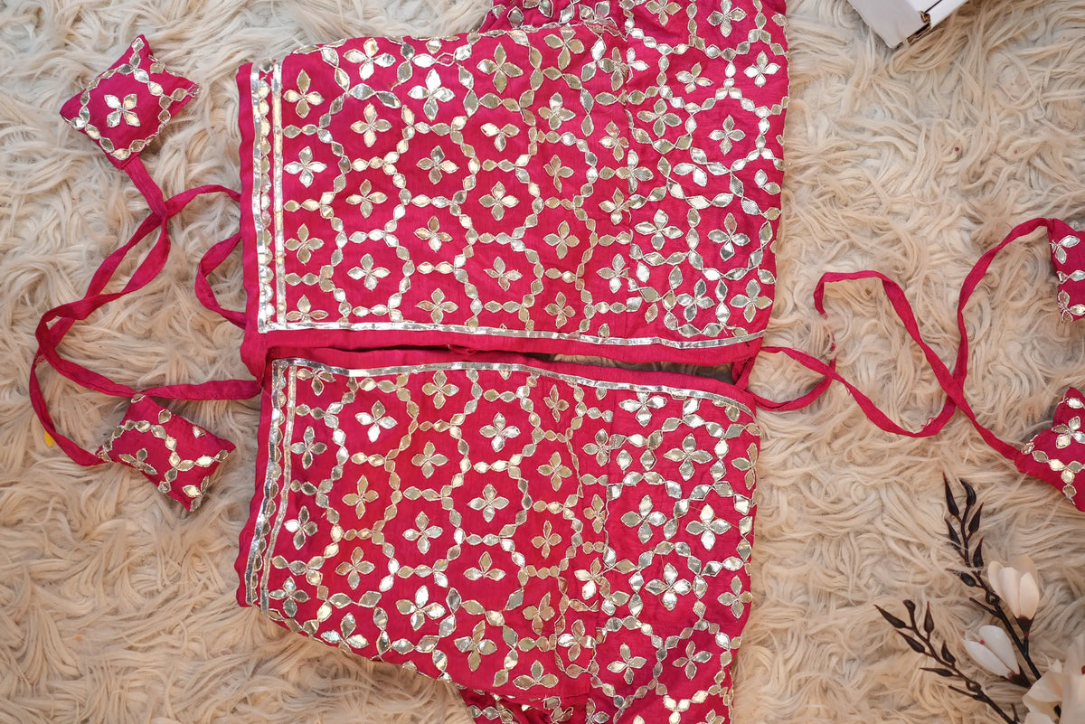 Back view detail of rani pink Aangi blouse featuring dense all-over floral Gota Patti work and tie-up dori