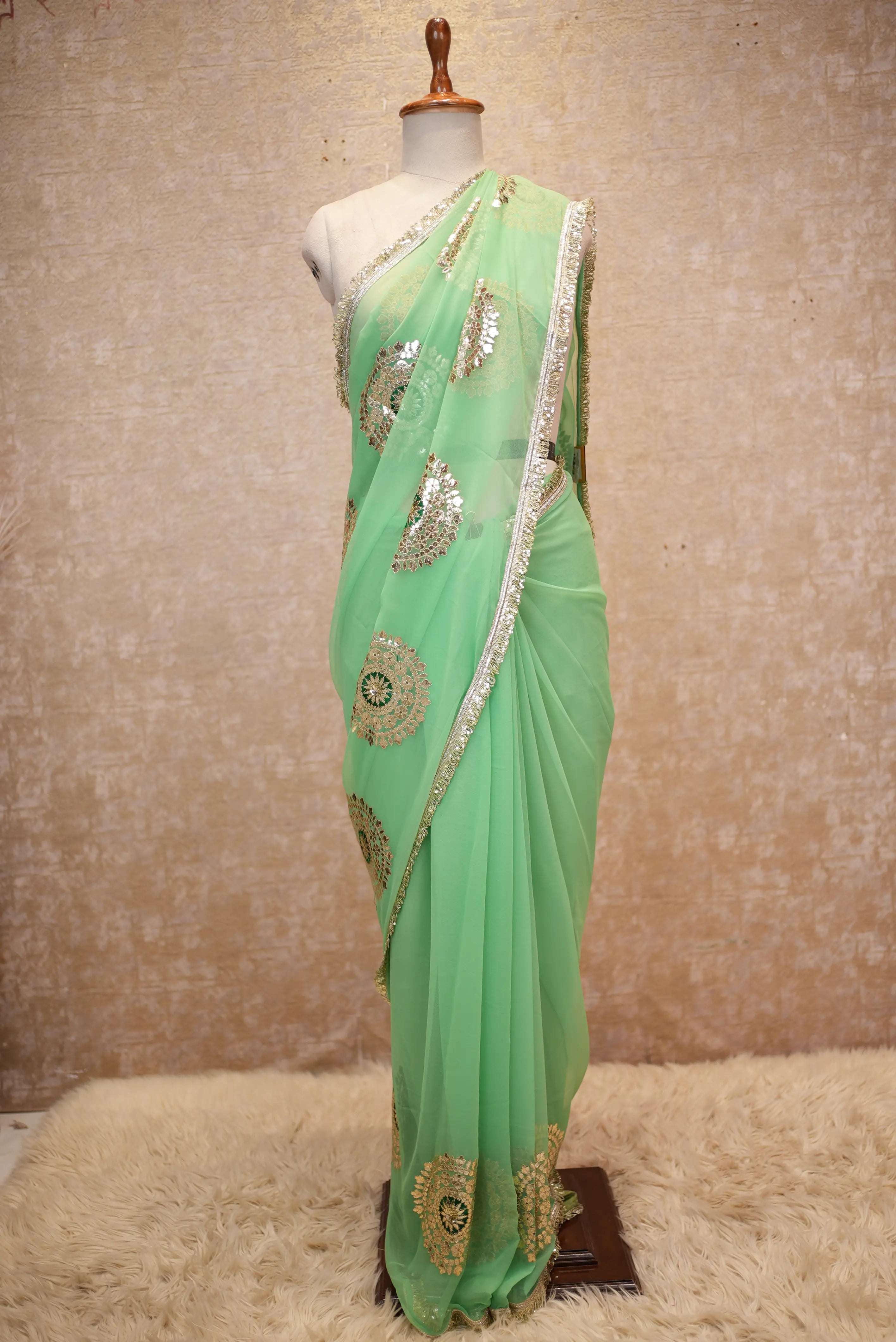 Emerald Designer Georgette Saree with Elegant Golden Work