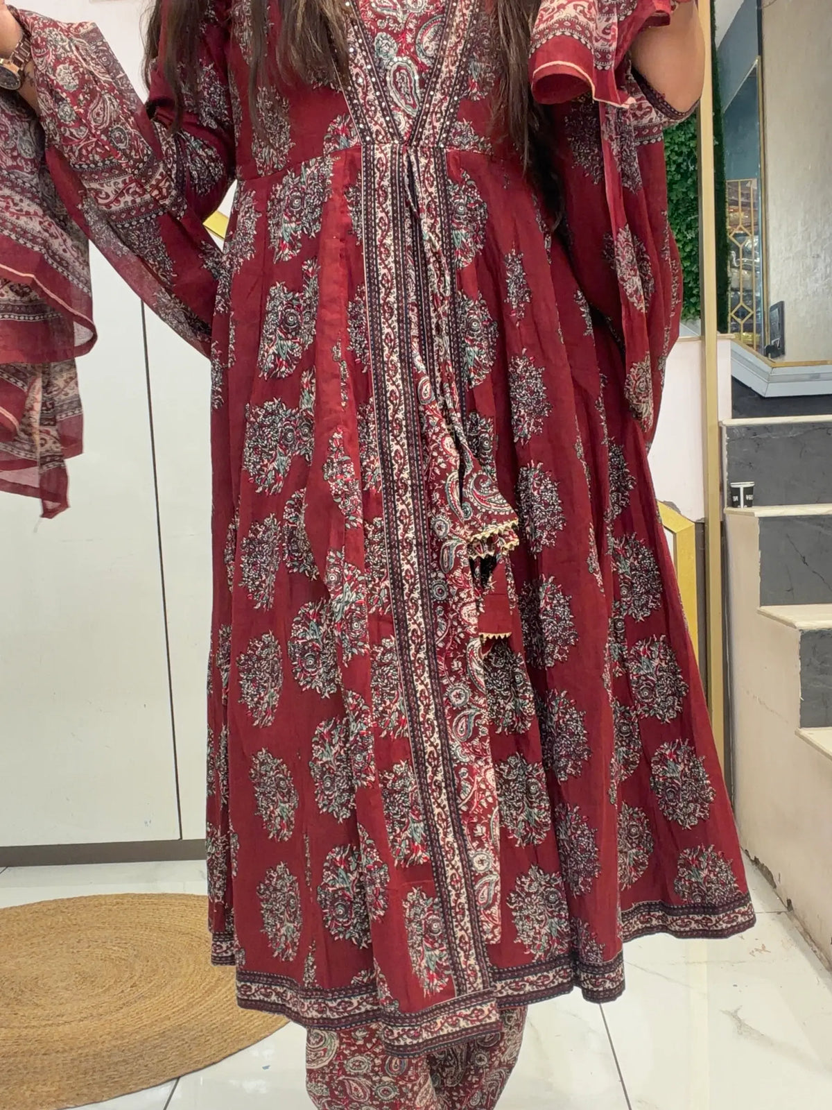 Front close-up view of Maroon Kalamkari Pure Cotton Anarkali Kurta with Angrakha Dori Tassels