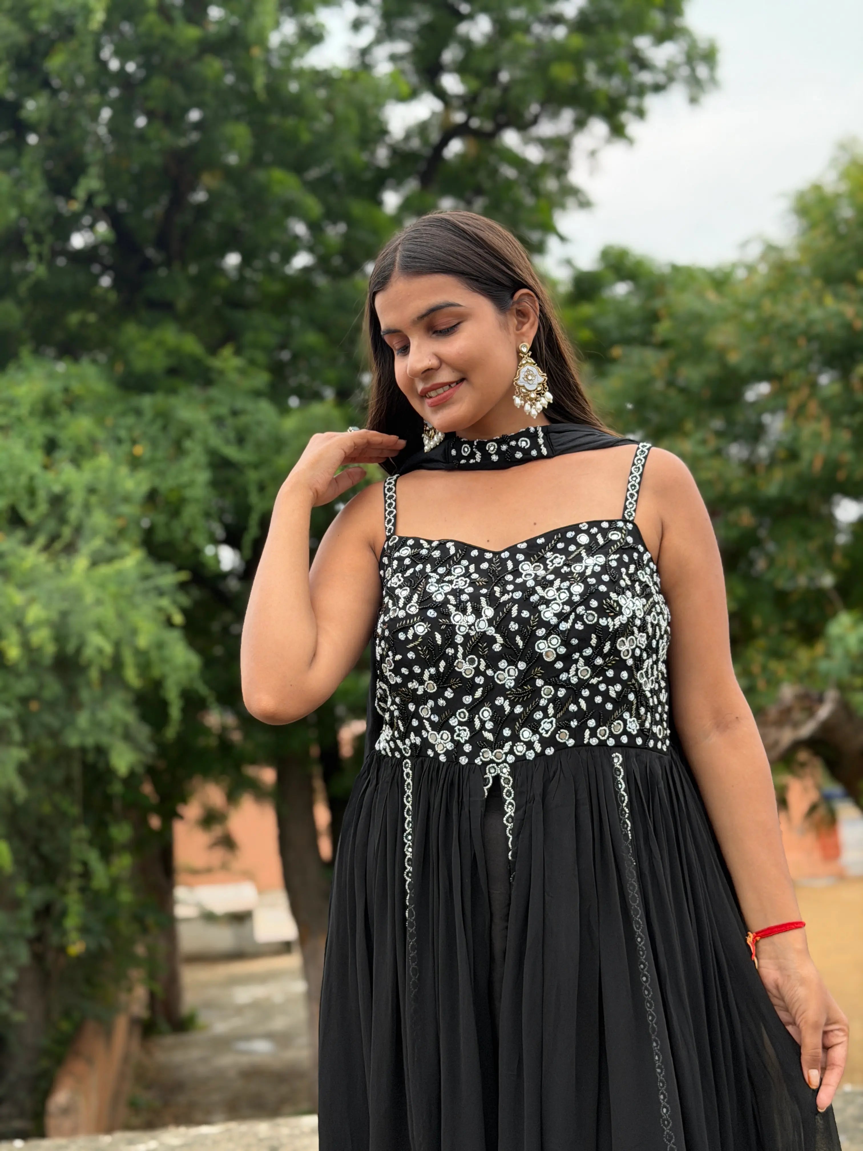 Handcrafted Mirror Work and Cutdana Embroidery Details on Black Dress Bodice