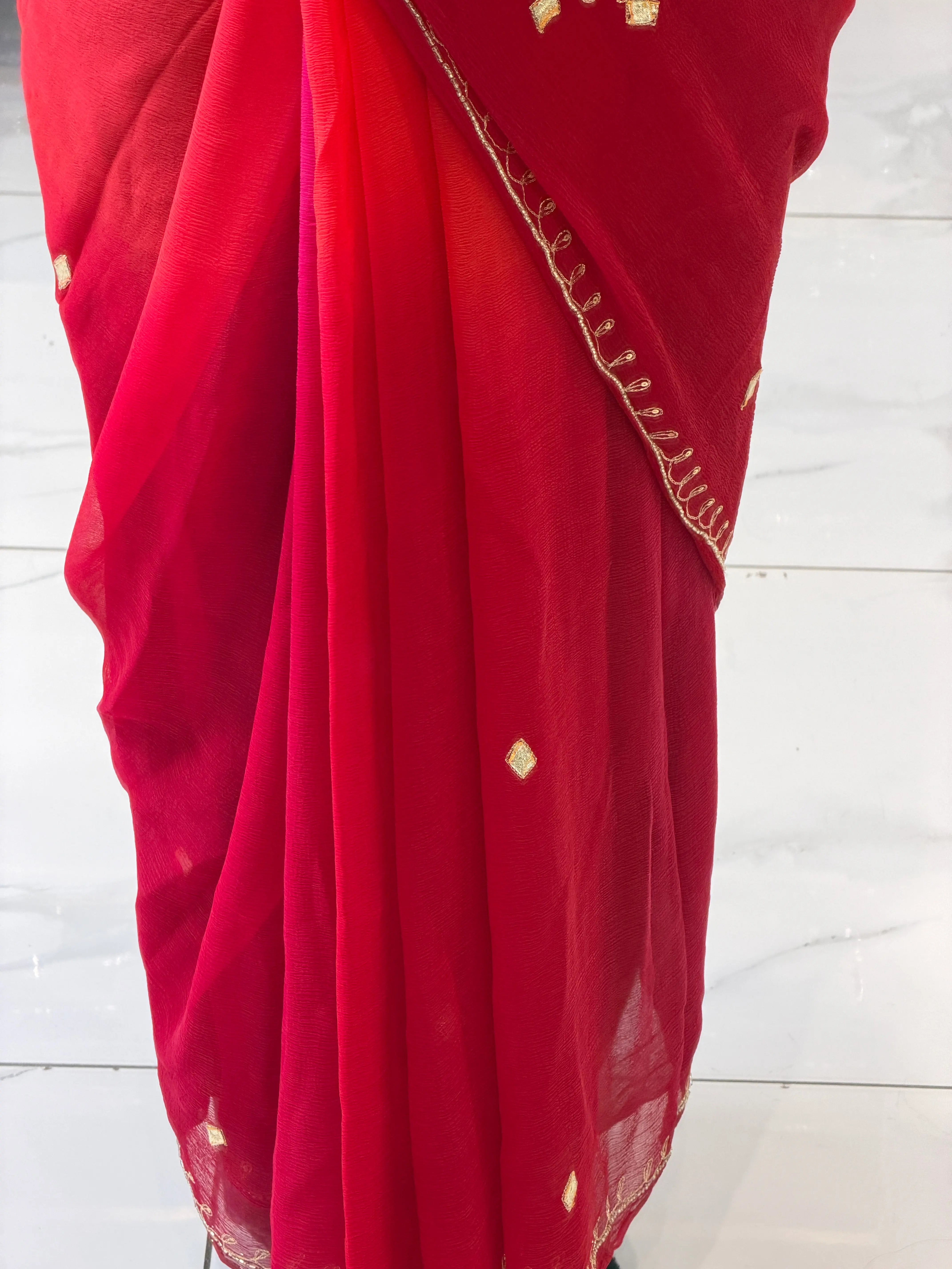 Close-up of Handcrafted Gota Patti and Mirror Motif on Pink Chiffon Saree