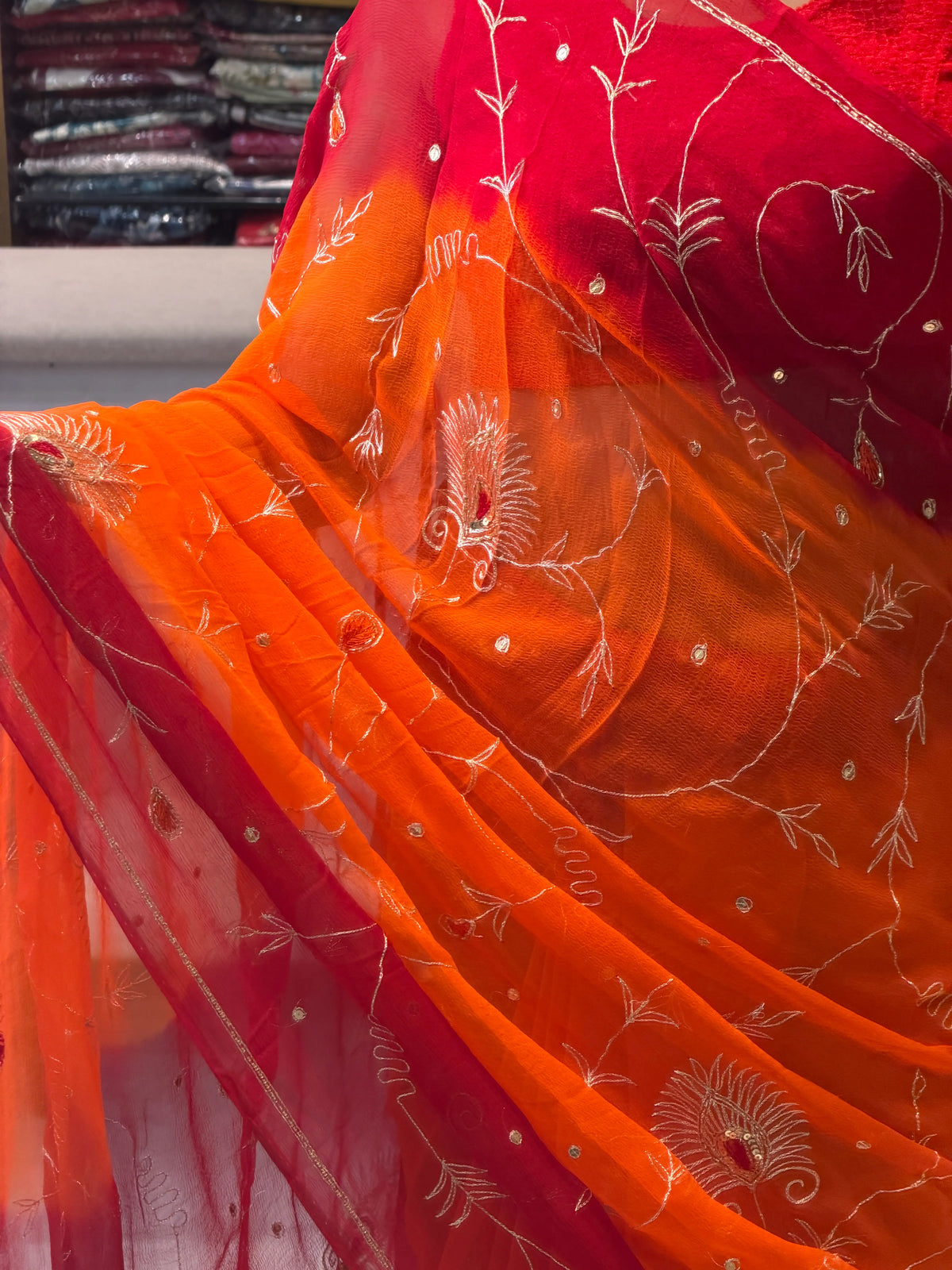 Close-up of All-Over Floral Leaf Embroidery Jaal on Dual Tone Red Yellow Pure Chiffon Saree