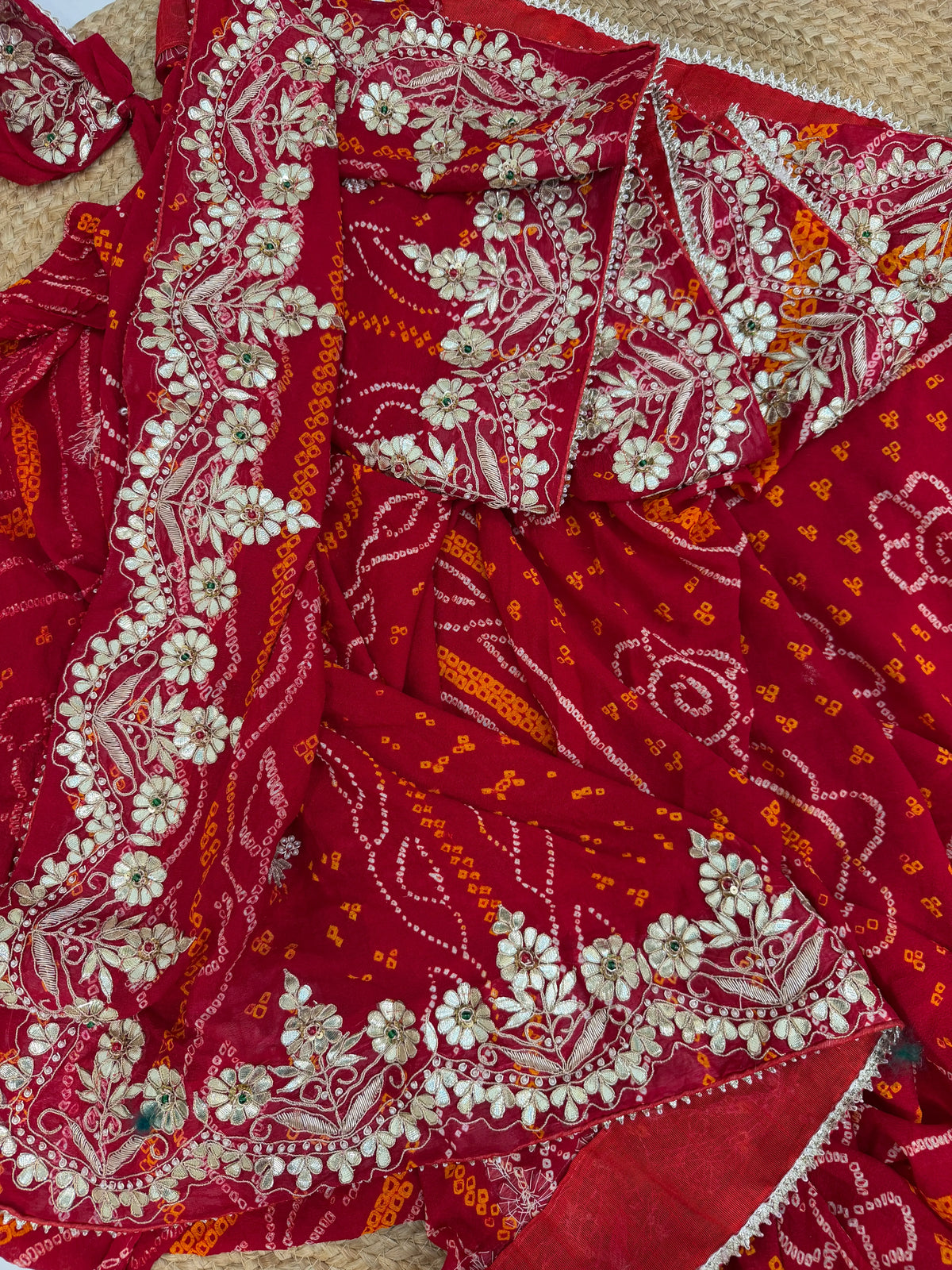 Detailed Lay View of Red and Saffron Ojariya Bandhani Tie Dye Pattern with Heavy Zardozi and Gota Patti Border