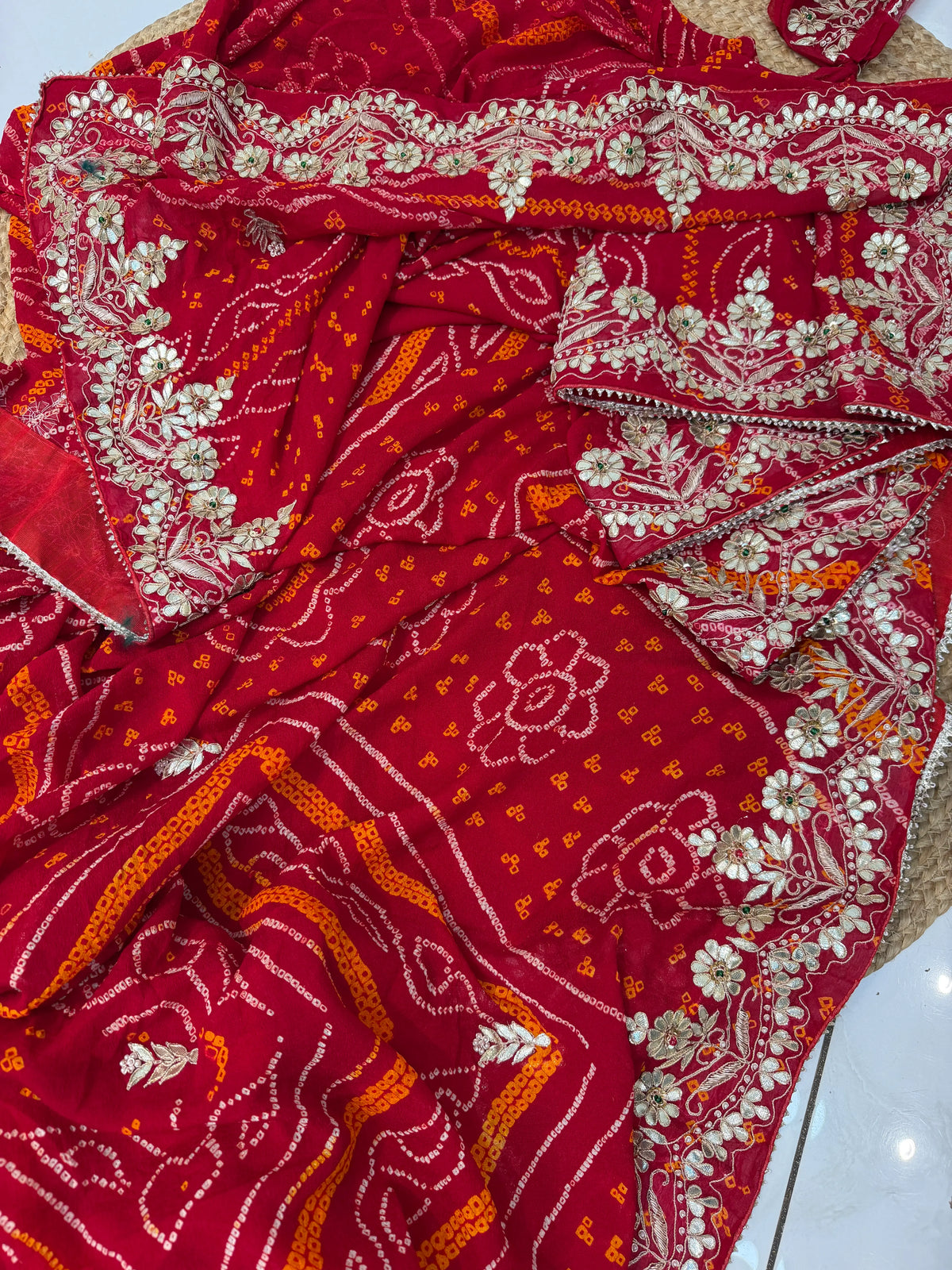 Red Pure Georgette Ojariya Bandhani Saree with Handcrafted Kaccha Gota Patti Border and Heavy Embroidered Blouse Piece