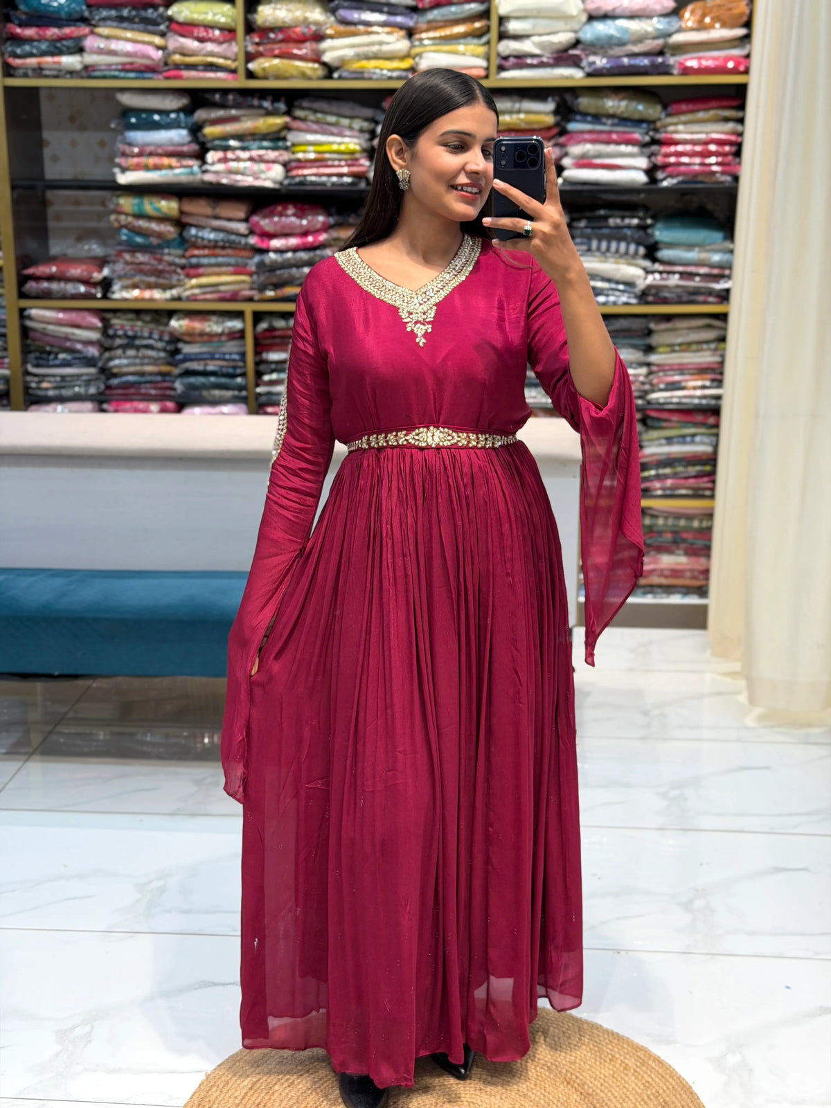 Full-length view of Mulberry Wine Indo-Western Gown with flared sleeves and matching waist belt