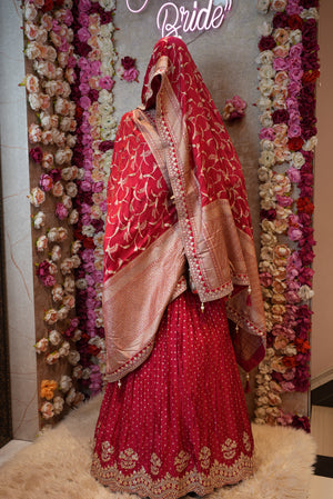 KARWA CHAUTH SOECIAL SINDOORI RED LEHENGA ON HC SILK FABRIC WITH BANRASI JARI WEAVING BUTI & GOTA PATTI WORK AND BANARASI ZARI WEAVING BORDER DUPATTA WITH HEAVY BLOUSE ##LC028