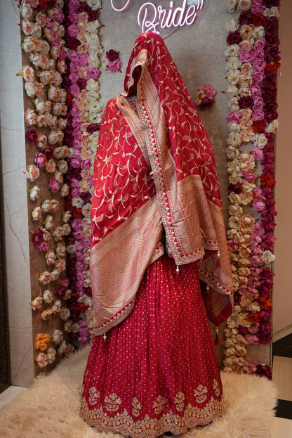KARWA CHAUTH SOECIAL SINDOORI RED LEHENGA ON HC SILK FABRIC WITH BANRASI JARI WEAVING BUTI & GOTA PATTI WORK AND BANARASI ZARI WEAVING BORDER DUPATTA WITH HEAVY BLOUSE ##LC028