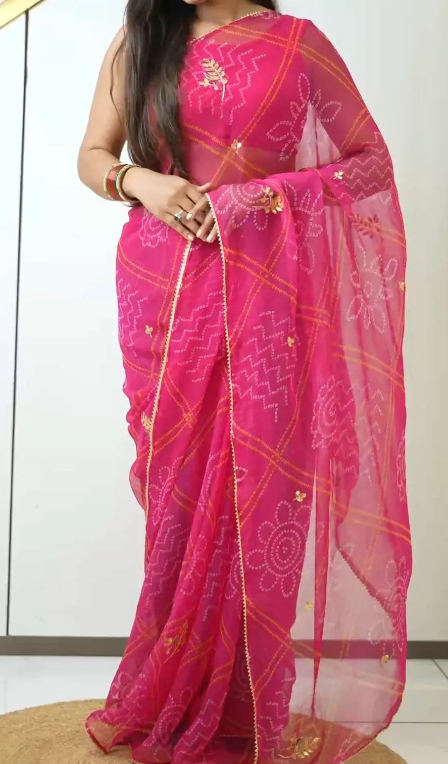 Full length view of deep emerald gajari chiffon bandhani saree with gota patti butta work